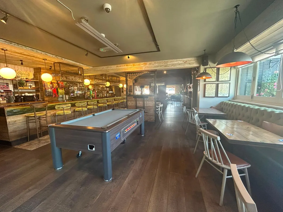 The pool table in the main bar